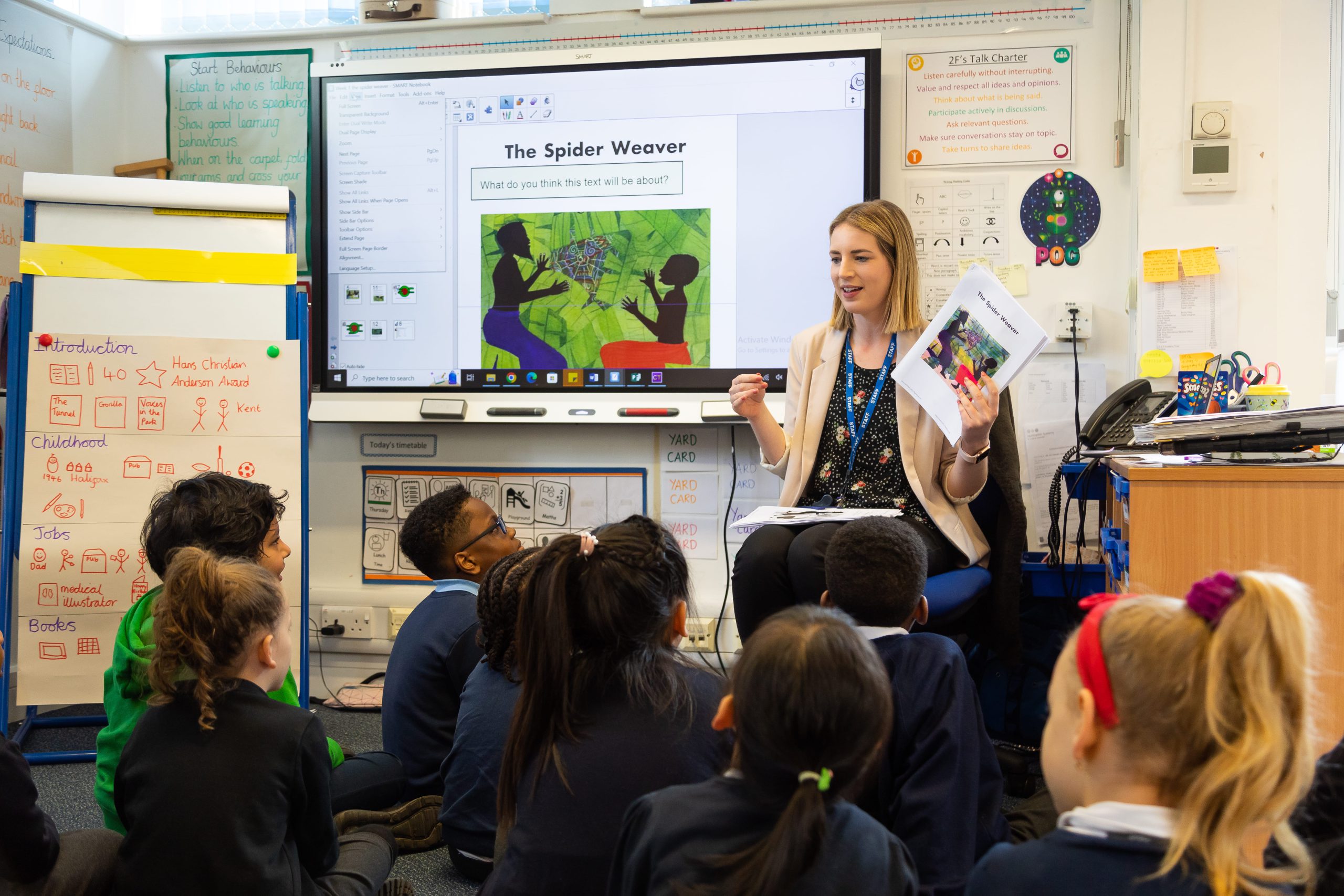 Teacher with school children at Huntingdon academy
