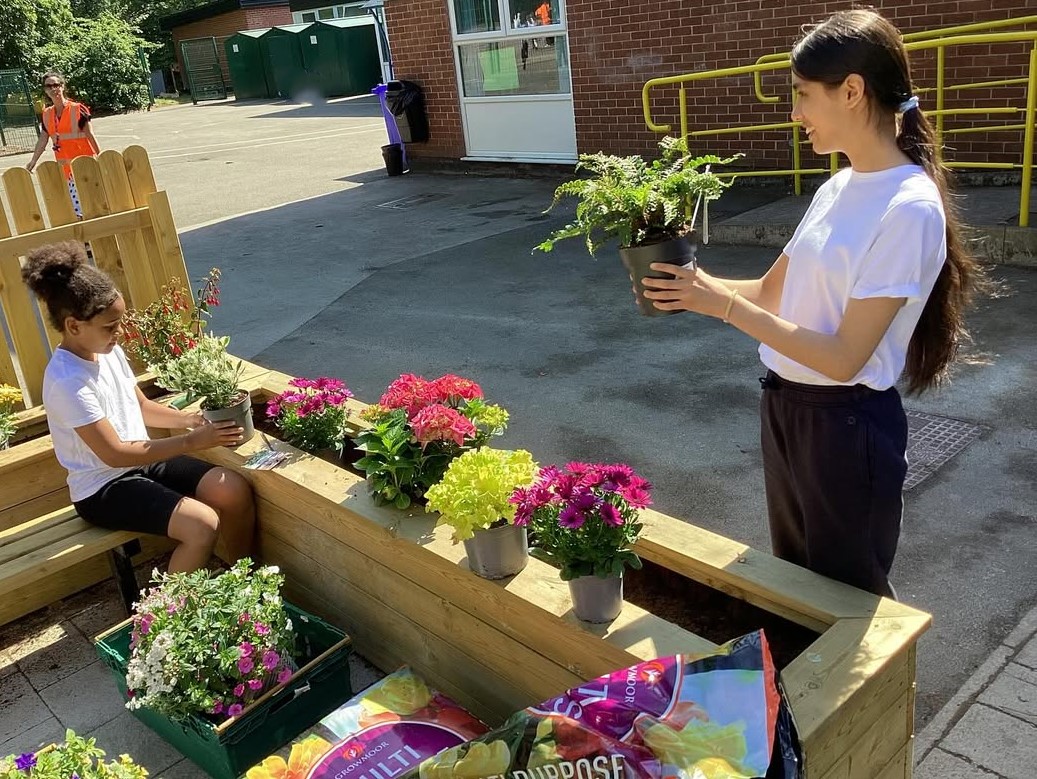 Huntingdon memorial garden flowers being planted